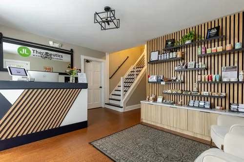 Reception and the retail wall at JL Therapeutics in Rochester, Michigan